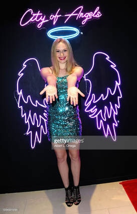 Rachelle Henry Red Carpet Luxury Gala Oscars Oscar Screening Party Host Actress Writer Director Producer Filmmaker Host The Lightning Hour Guest Guests Hosts Hollywood Sheraton Universal Hotel City Hollywood CA California Los Angeles LA Selfie Wrld Instagram Pop-Up Getty Images Influencer Blonde Blue Eyes Angel Halo Wings Ciry of Angels